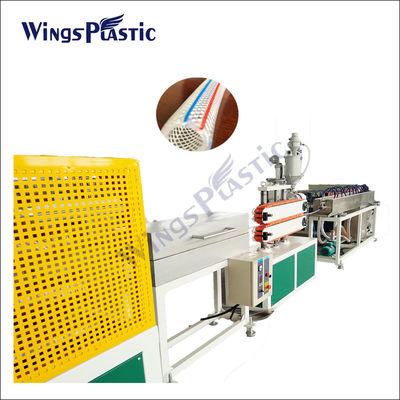 Production de tuyaux à extrusion renforcés de fibres de PVC