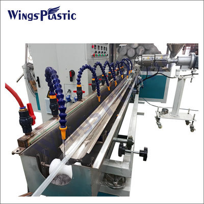 Ligne d'extrusion de tubes souples renforcés de fibres de PVC